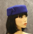 Pillbox hat of cobalt blue wool with geometric stitched design throughout