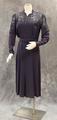 Evening dress of purple-blue rayon crepe  with yoke of embroidered  braided cord on net