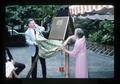 Dean Douglas Caldwell and Mrs. Burt unveiling plaque at Burt Hall dedication, Oregon State University, Corvallis, Oregon, 1987