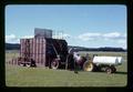 Field burner (thermal sanitizer) with crew, Oregon, June 1971