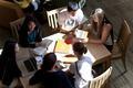 Aerial view of students having discussion in Global Scholars Hall