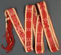 Belt or Sash of red twisted cotton or wool, and white, red, pale yellow, and green cotton
