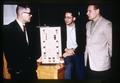 Virgil Freed and two graduate assistants with display of products made from ryegrass straw, Oregon State University, Corvallis, Oregon, circa 1965