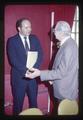 OSU Vice President Clifford Smith visiting with Herb Sinnard at Triad Club, Oregon State University, Corvallis, Oregon, March 1979