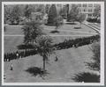 Graduates gathered in Memorial Union quadrangle before processing to the Men's Gymnasium