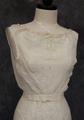 Corset cover of white cotton batiste with wide neckline with drawstring casing