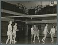 Women playing volleyball in the Women's Building, 1938