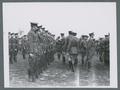 Officers reviewing cadets in formation, circa 1923