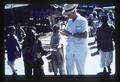 D. D. Hill offering change on the street, India, 1979