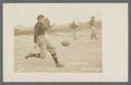 Football player, John Oscar "Octy" Enberg punting, circa 1910