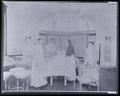 St. Vincent's Hospital. Surgery scene-nurses, nun, and doctors gathered around operating table