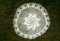 Crocheted doily, about 7 inch diameter