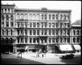 Abington Building on 3rd St., Portland. Tailor and clothing store on street level. Auto parked at curb.