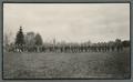 Cadet formation marching on parade field, circa 1920