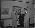 E. H. Weigand, Head of Food Technology, left, and Dr. Albert N. Steward, Curator of the Herbarium, center, meeting at a session of the campus chapter of the Institute of Food Technologists, October 15, 1951