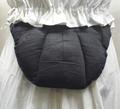Bustle pad of cotton and black sateen belted with buckle closure