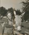 Prospector with donkey at Pendleton Round-up