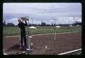 Gary Jarman installing temperature measuring device, Oregon State University, Corvallis, Oregon, circa 1970