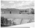 View of Weatherford Hall dorm complex and tennis courts looking north, June 1957