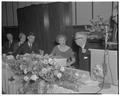 Mollie Strand speaks to her husband while E.B. Lemon, Antoinette Hatfield and Mark Hatfield look on