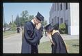 Dr. Harold Jensen and Kamol Dara at OSU commencement, 1965