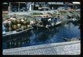 Boats with agricultural goods on canal in Southeast Asia, circa 1970