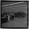 Students using the card catalog in the Kerr Library