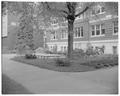 Flower garden and benches on south side of Home Economics Building, May 1959