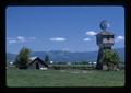 Old barn and windmill near Harrisburg, Oregon, May 1974