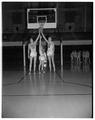 OSC basketball players Wade "Swede" Halbrook, Ron Robins, and Phil Shadoin