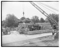 Joe Butts, W. Weniger, J. J. Brady, R. R. Dempster, and colleague at installation of new cyclotron, 1950