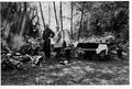 Campers in front of a picnic table #18  86-062-426