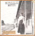Susie Ward, Kingsley teacher, sister of Jim Ward, owner of Kingsley store. (standing in front of Kingsley Hotel)