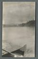 Railroad bridges viewed from the river, circa 1910