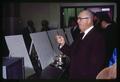 State Senator Walter Leth sampling dried fish stick, Seafoods Laboratory dedication, Oregon State University, Astoria, Oregon, circa 1965