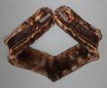Collar of brown mink fur shaped to go around neckline with clamps at the ends
