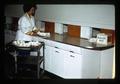 Technician in Food Science and Technology at Flavorium taste test counter, Oregon State University, Corvallis, Oregon, March 1969
