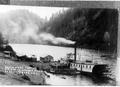 Stage (horse drawn) at dock for Scottsburg OR on Umpqus River meeting stern wheeler ""Eva""