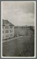 Cadet regiment marching to parade field behind Education Building, circa 1920