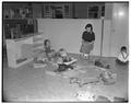 Cherrie Knox working with children at the Orchard Street nursery school, 1952