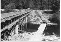 Construction of the Prichard Creek (Cannibal Mtn.) bridge at the north end of the present day 58 Road where it connects with Highway 34.