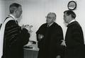 Dr. Dale Parnell (middle) speaking with Vincennes University president Phillip M. Summers and VU Vice President David Ford