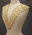 Collar of ecru crocheted net with chenille yarn embroidery