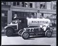 Richfield Oil Co. Richfield Tank Truck and Racing. Car lined up in front of John K. Leander, INC.