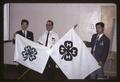 Ben Newell with Japanese farm trainees holding 4-H flags, 1967
