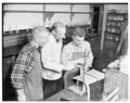 Dr. Wendell Slabaugh with two high school students enrolled in the Junior Engineers and Scientists Summer Institute (JESSI), 1957