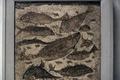 Mosaic of eight fish, shells, and seaweed