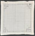 Napkin or Doily of white linen with drawn-work band that has intersecting squares at the corners
