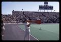 Cheerleader John Koski yelling through a megaphone at Oregon State University vs USC football game, Oregon State University, Corvallis, Oregon, circa 1969
