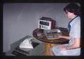 Nan Scott with HP calculator, Mettler P515 scale, and generator, Oregon State University, Corvallis, Oregon, 1977